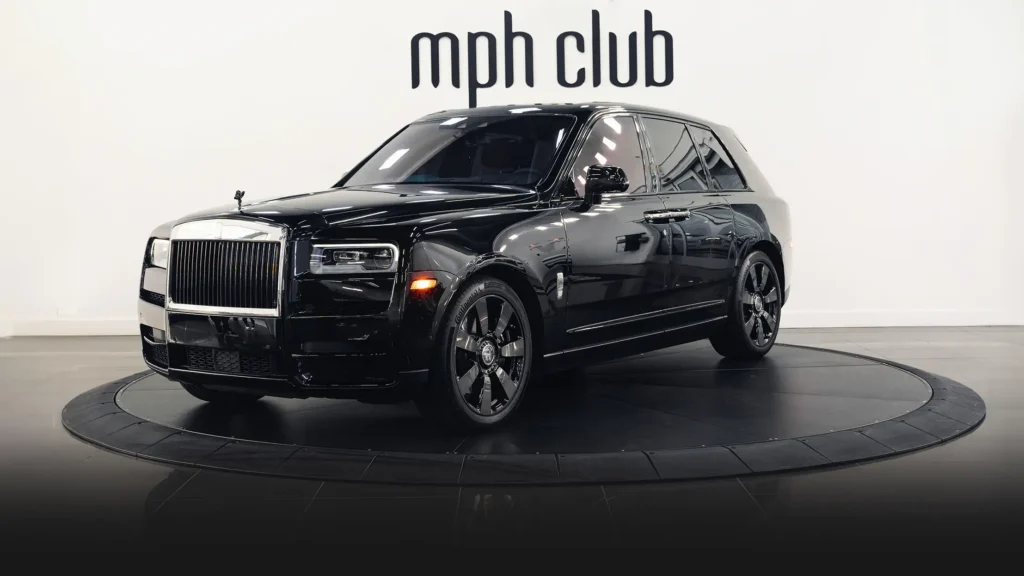 Black on pink Rolls Royce Cullinan rental profile view mph club