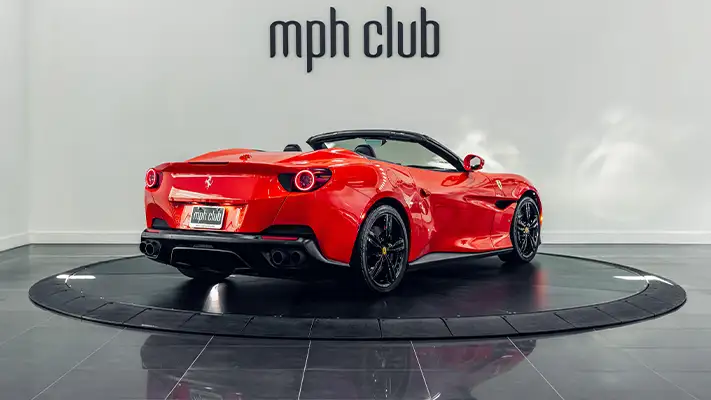 Red Ferrari Portofino rental rear view - mph club
