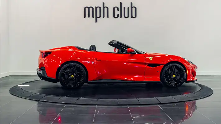 Red Ferrari Portofino rental side view mph club