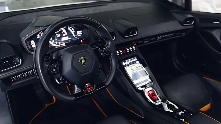 White matte Lamborghini Huracan EVO Spyder rental dashboard view turntable mph club