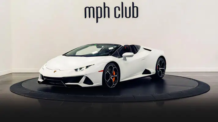 White matte Lamborghini Huracan EVO Spyder rental side view turntable rszd mph club