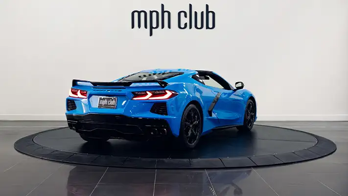 Blue Chevrolet Corvette C8 rental rear view - mph club turntable