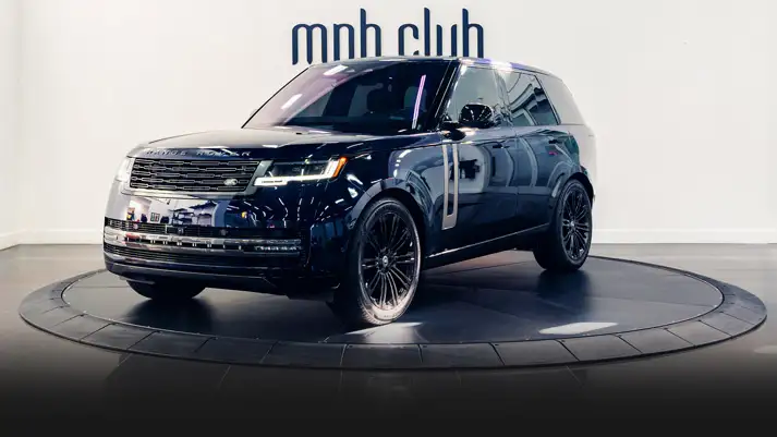 Blue Range Rover rental Miami profile view rszd mph club