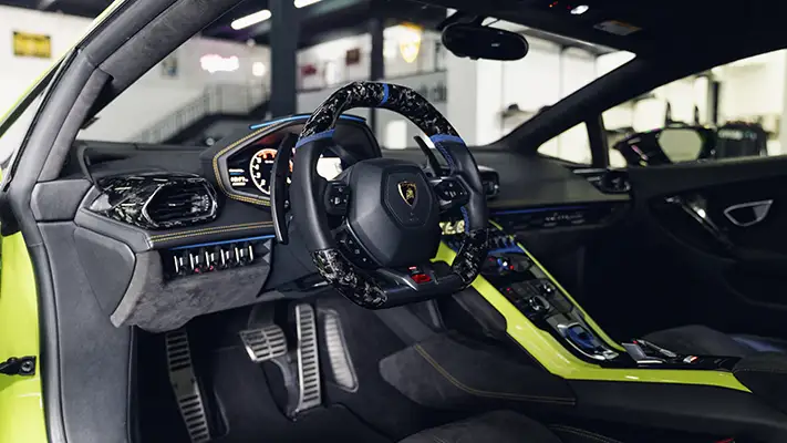 Green Lamborghini Huracan rental dashboard view - mph club