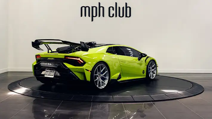 Green Lamborghini Huracan rental rear view - mph club