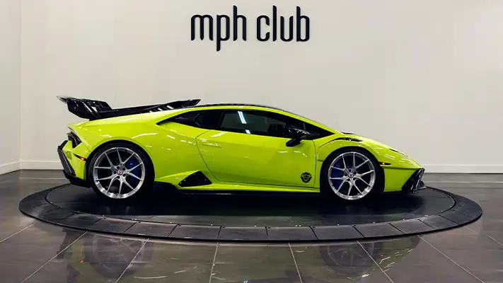 Green Lamborghini Huracan rental side view - mph club