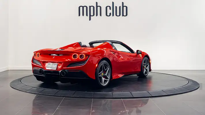 Red with white Ferrari F8 Spider rental rear view - mph club