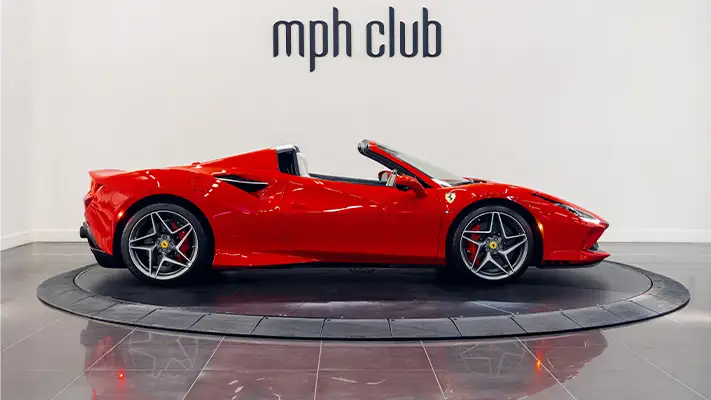 Red with white Ferrari F8 Spider rental side view - mph club