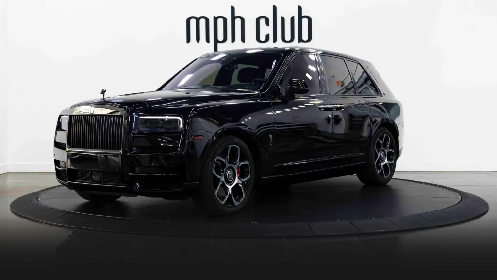Black on black Rolls Royce Cullinan Black Badge rental profile view - mph club 2