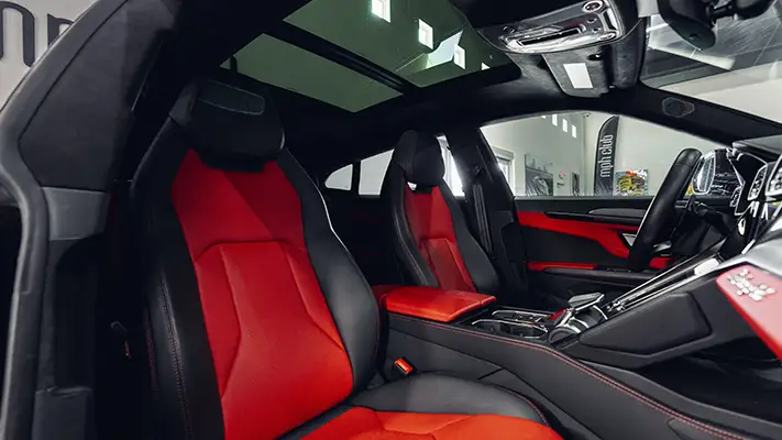 Black on red Lamborghini Urus rental interior view turntable - mph club