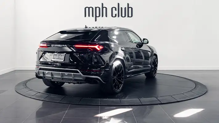 Black on red Lamborghini Urus rental rear view turntable - mph club