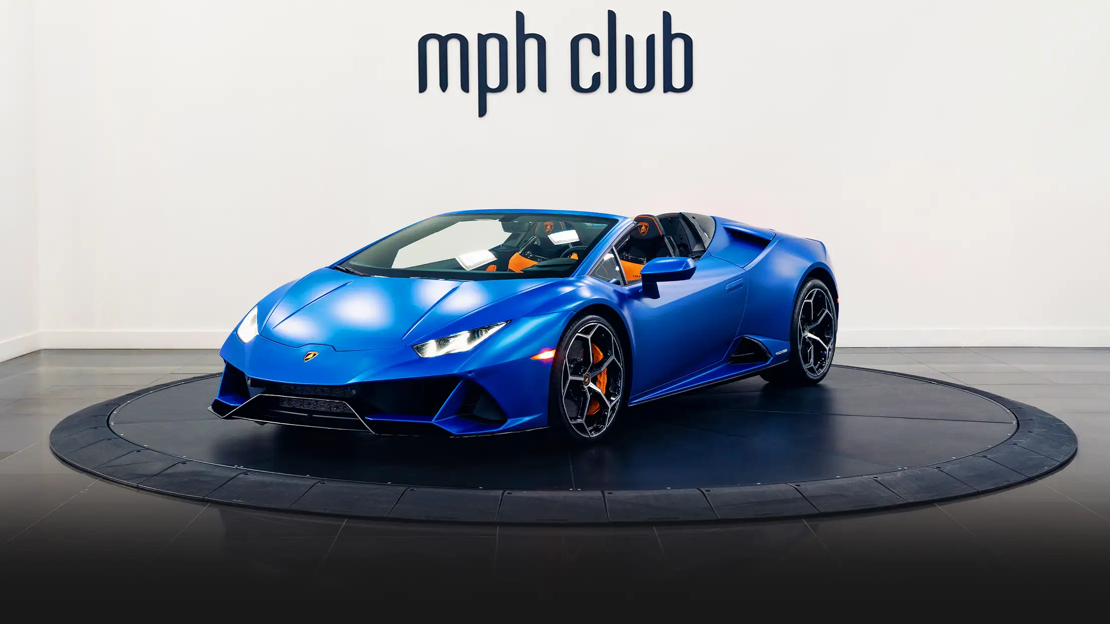 Blue matte Lamborghini Huracan EVO Spyder rental side view - mph club