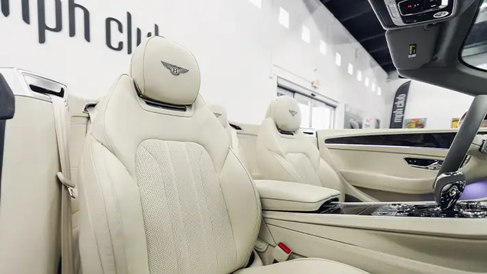 Gold Bentley Continental GTC rental interior view - mph club