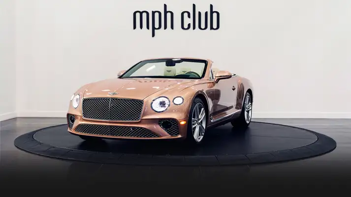 Gold Bentley Continental GTC rental profile view rszd - mph club