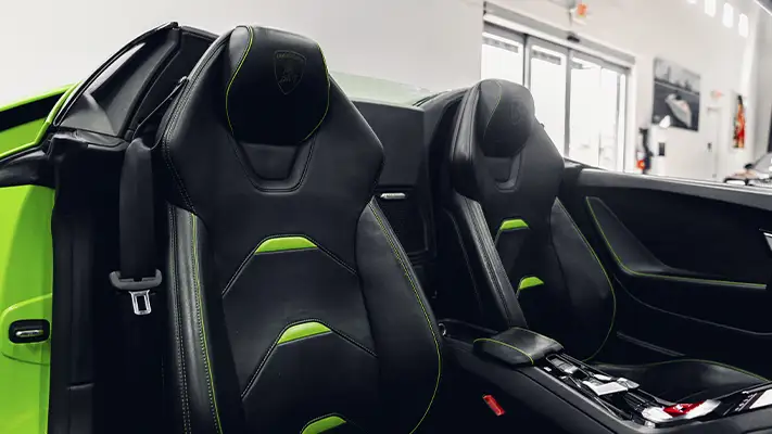 Green on black Lamborghini Huracan EVO Spyder rental interior view - mph club