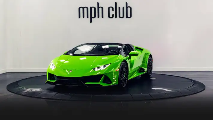 Green on black Lamborghini Huracan EVO Spyder rental profile view rszd - mph club