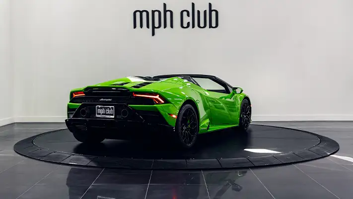 Green on black Lamborghini Huracan EVO Spyder rental rear view - mph club