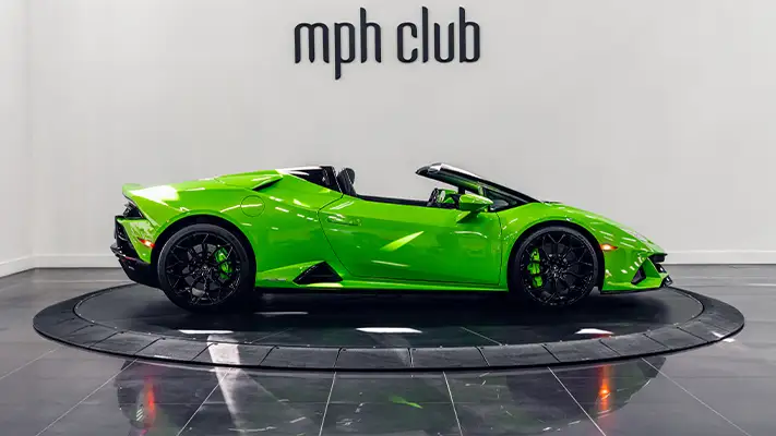 Green on black Lamborghini Huracan EVO Spyder rental side view - mph club