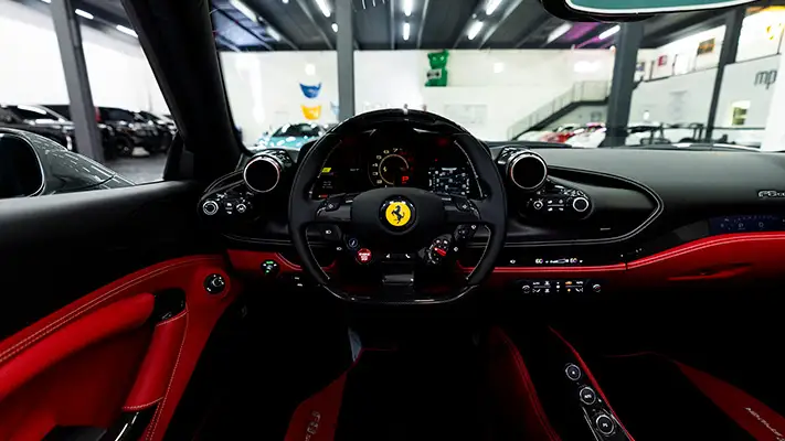 Grey Ferrari F8 Spider rental dash view - mph club
