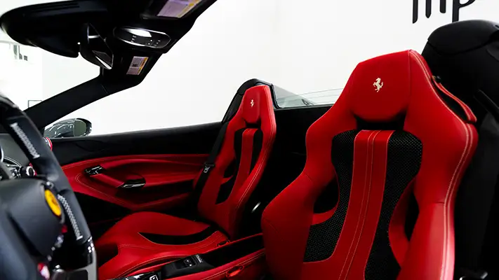 Grey Ferrari F8 Spider rental interior view - mph club