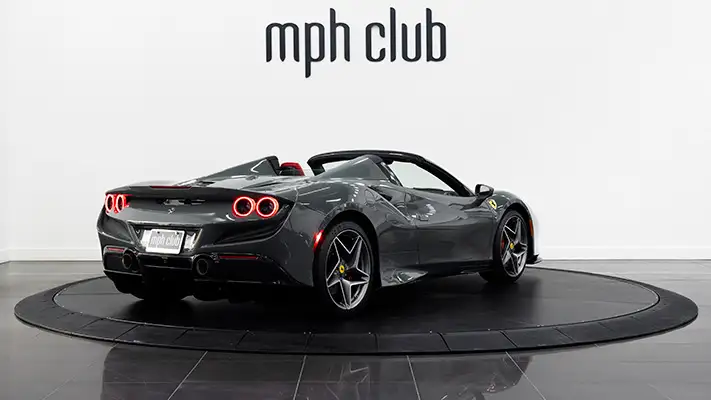 Grey Ferrari F8 Spider rental rear view - mph club