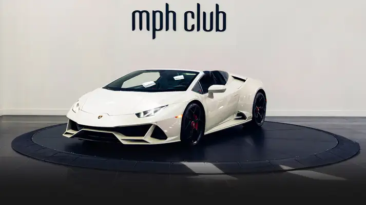 White on red Lamborghini Huracan EVO Spyder rental profile view rszd - mph club