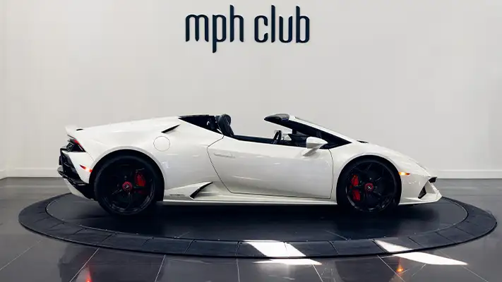 White on red Lamborghini Huracan EVO Spyder rental side view - mph club