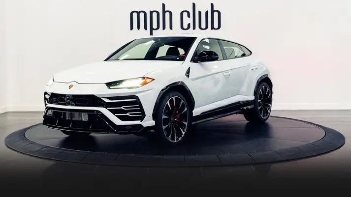 White on red Lamborghini Urus rental Miami side view turntable rszd - mph club