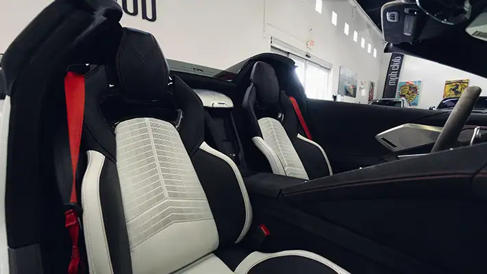 White on white Chevrolet Corvette C8 rental interior view - mph club
