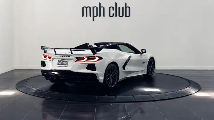 White on white Chevrolet Corvette C8 rental rear view - mph club