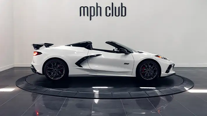 White on white Chevrolet Corvette C8 rental side view - mph club