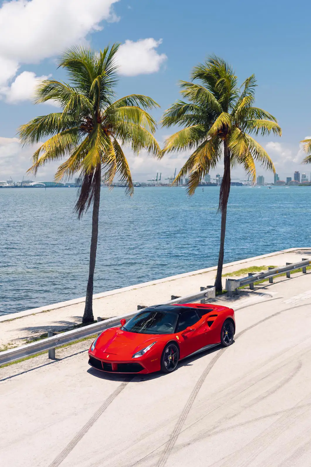 Ferrari 488 sitting beside the Miami water: a presence like no other.
