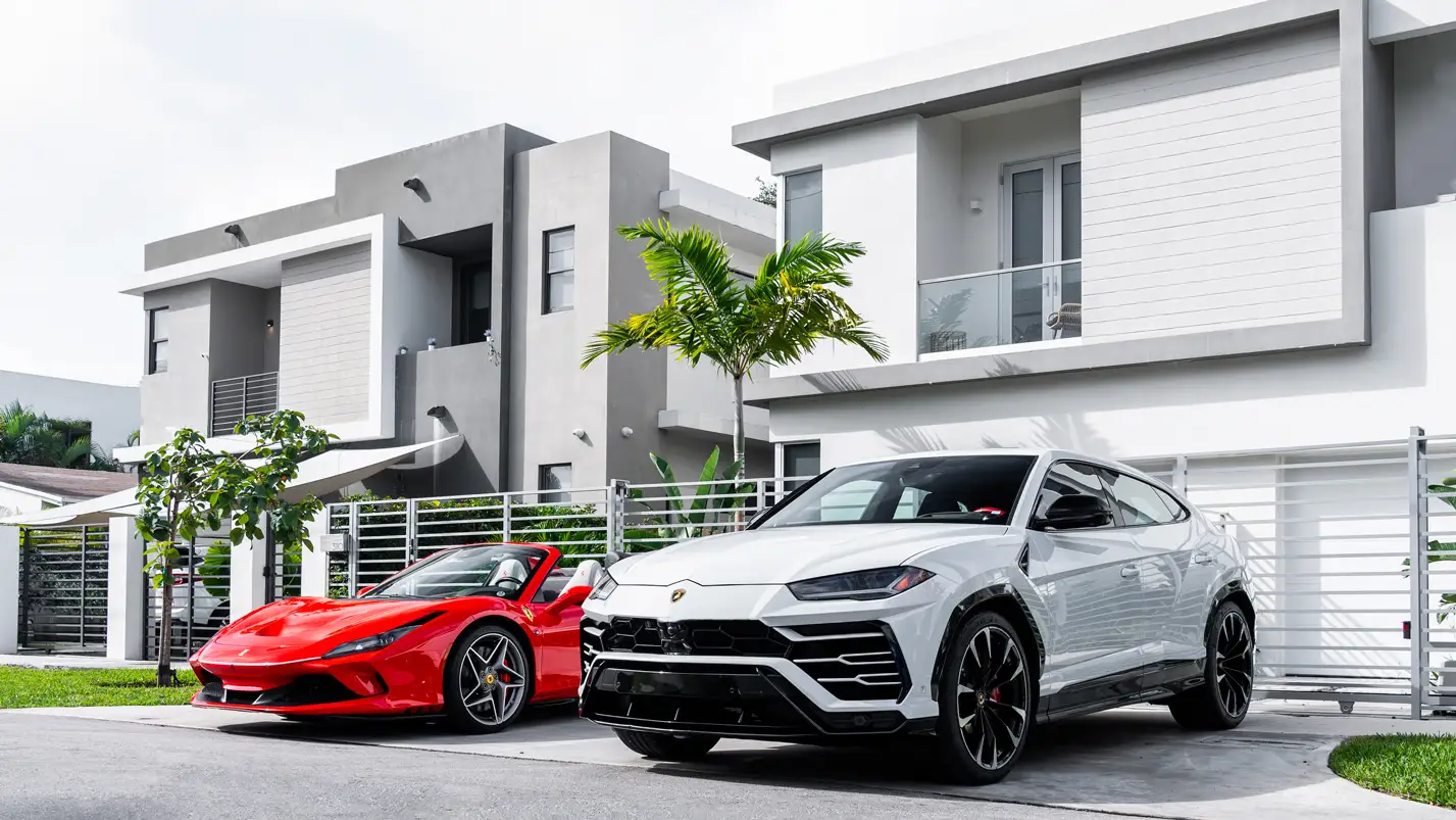Ferrari F8 and Lamborghini Urus rental from mph club parked at Host and Keep property