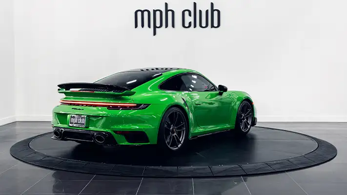Green Porsche 911 Turbo S rear view - mph club