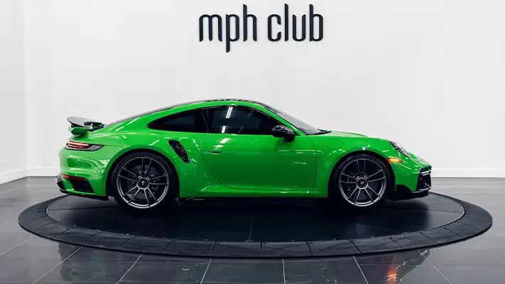 Green Porsche 911 Turbo S side view - mph club