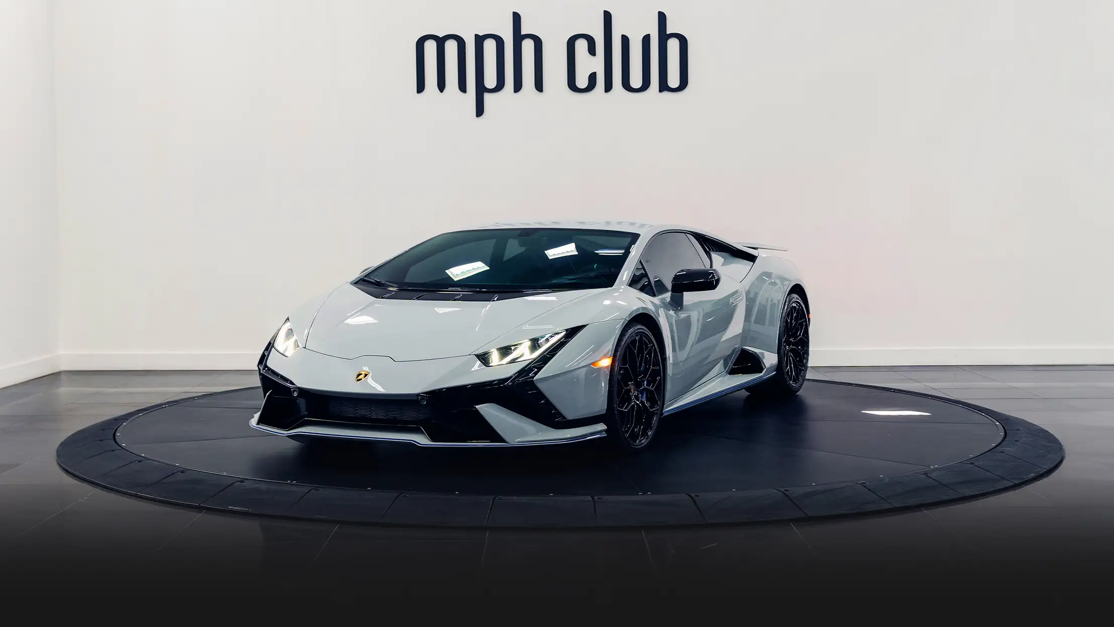 Grey Lamborghini Huracan Tecnica rental miami profile view - mph club
