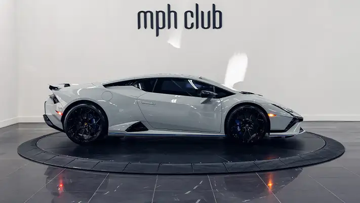 Grey Lamborghini Huracan Tecnica rental miami side view - mph club