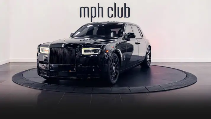 Black on black Rolls Royce Phantom rental profile view rszd - mph club