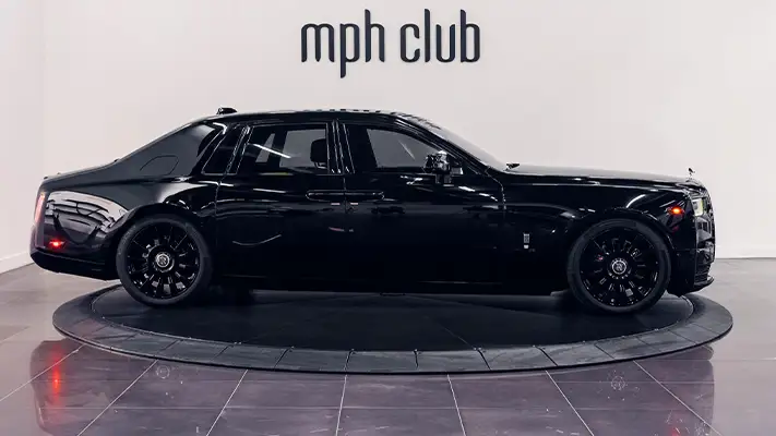 Black on black Rolls Royce Phantom rental side view - mph club
