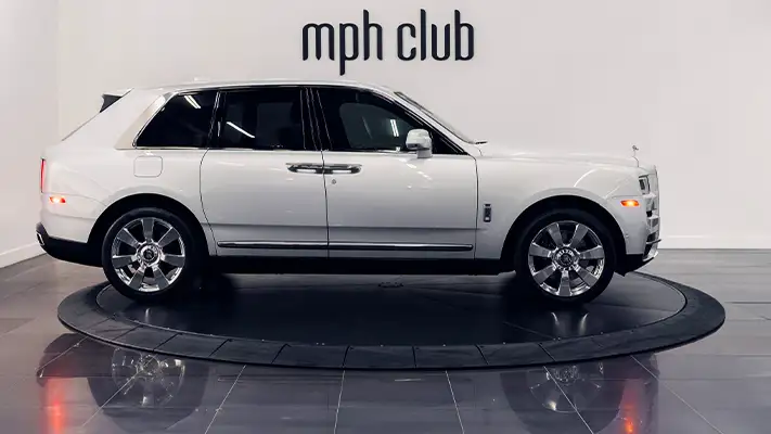 Grey on white Rolls Royce Cullinan rental side view - mph club