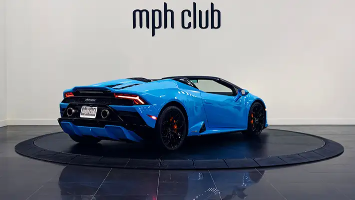 Blue with orange Lamborghini Huracan Evo Spider rental rear view turntable - mph club