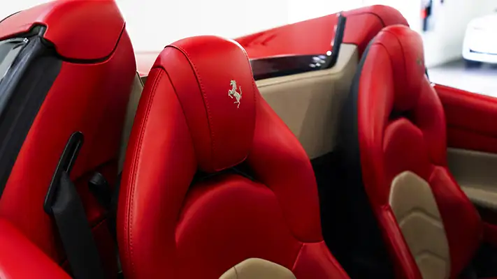 Red on red Ferrari 488 Spider for rent interior view - mph club