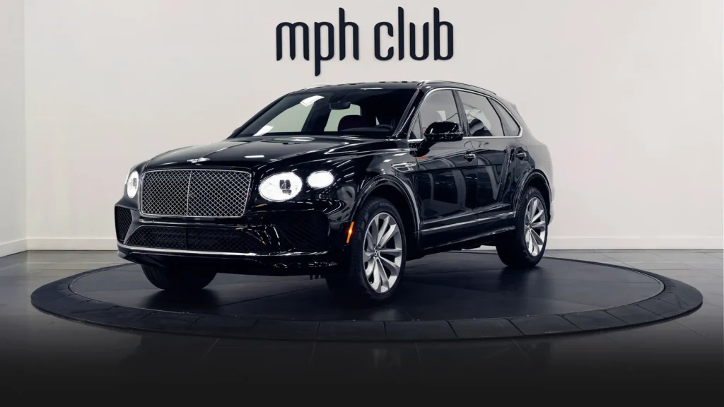 Black Bentley Bentayga rental profile view - mph club