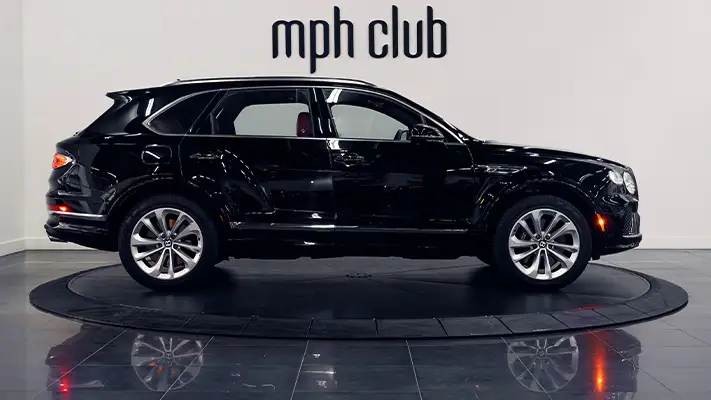 Black Bentley Bentayga rental side view - mph club