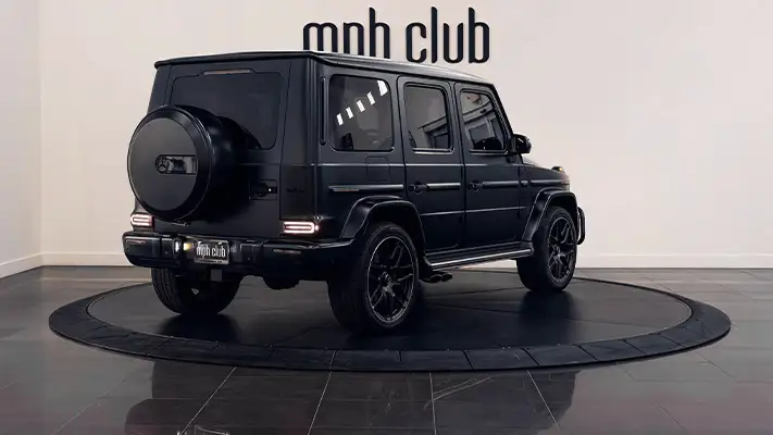 Black matte with red Mercedes Benz G63 rental rear view - mph club