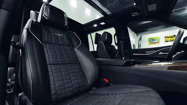 Black on black Cadillac Escalade rental interior view turntable - mph club
