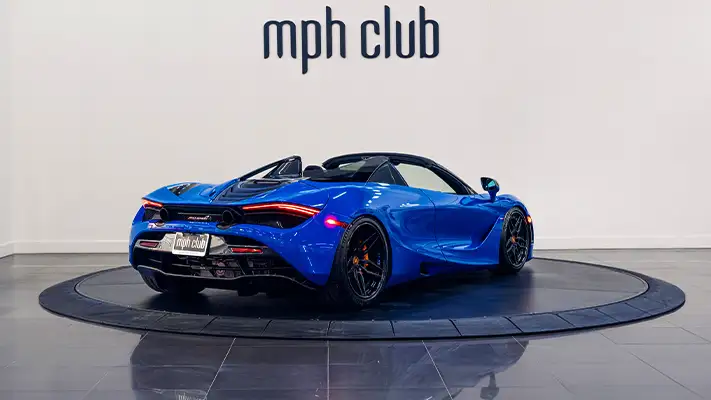 Blue McLaren 720S Spider rental rear view - mph club