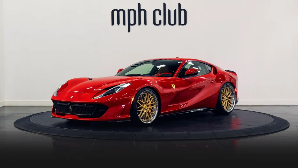 Red Ferrari 812 Superfast rental profile view - mph club