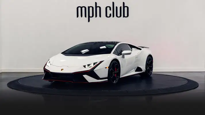 White Lamborghini Huracan Tecnica rental Miami profile view rszd - mph club