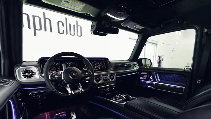 Black on black Mercedes Benz G63 AMG G Wagon rental dashboard view - mph club